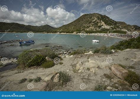 The Whole Punta Molentis Beach Stock Photo - Image of rocks, moored ...