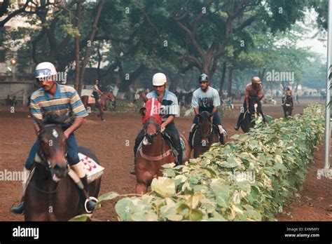 Jockey riding horses, Mahalaxmi Race Course, Mahalakshmi, Bombay ...