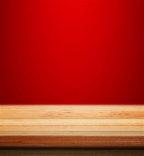 Free Photo | Empty wooden table with red christmas background for product placement with blur ...