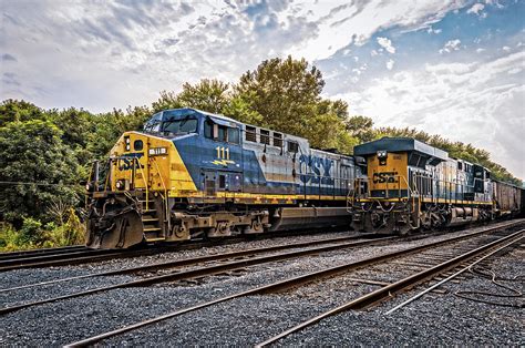 CSX CW44AC Locomotive No 111 and ES44AC Locomotive No 890 Photograph by Mark Summerfield