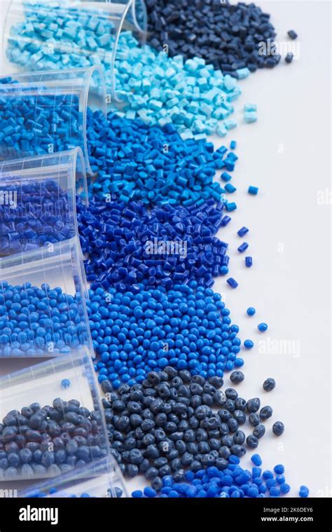 different blue plastic resin granulates for injection moulding process in different granulate ...