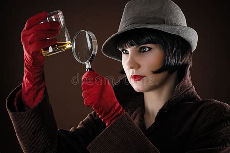 Woman detective examines stock image. Image of dark, female - 39778863