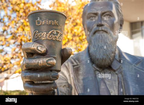 Coca-Cola inventor and founder, John Pemberton, is featured in a bronze sculpture greeting ...