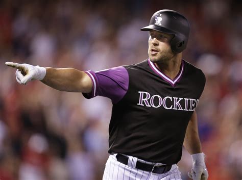 Holliday homer, big inning lead Rockies past Cardinals 9-1