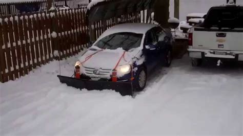 Nordic V-Plow on a Gravel Driveway Pushed by a Small Car - YouTube