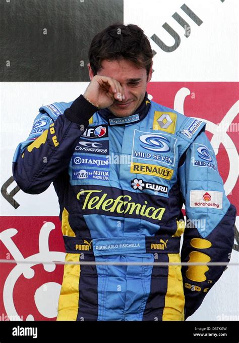 Third placed Italian Formula One driver Giancarlo Fisichella of Renault ...