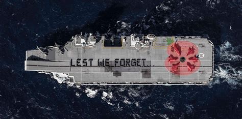 HMS Queen Elizabeth's crew spelling out 'lest we forget' : r/CasualUK