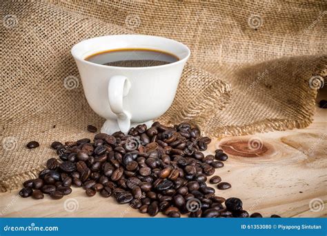 Cup of Americano Coffee and Coffee Beans Stock Photo - Image of gourmet, coffee: 61353080