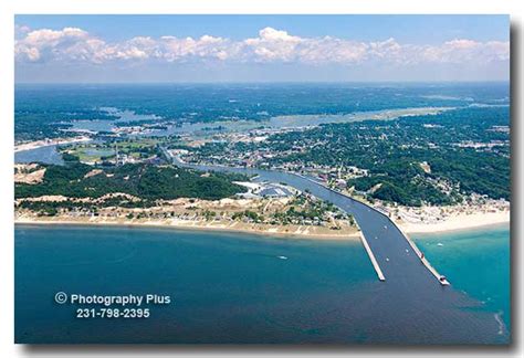 Aerial photo of Grand Haven, MI and the Grand River shot from out over Lake Michigan