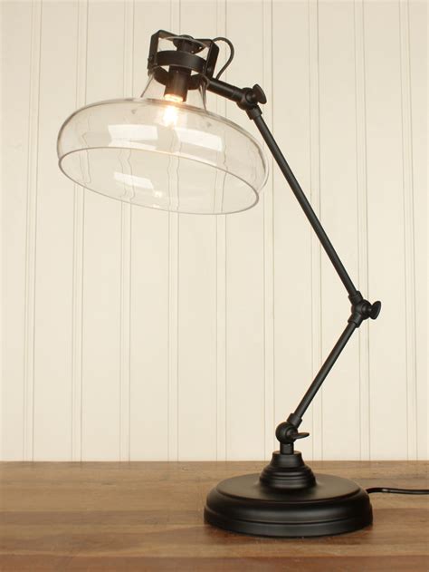 Industrial table lamp in a black finish with a clear glass shade and ...