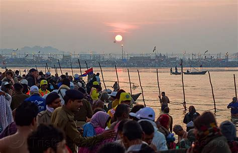 sunrise over the ganges river at sangam, kumbh mela 2013, india