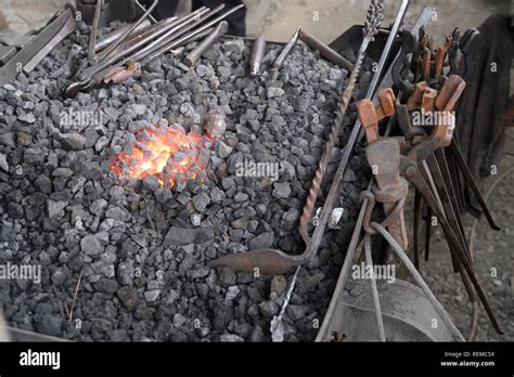 Blacksmith forge with tools Stock Photo - Alamy