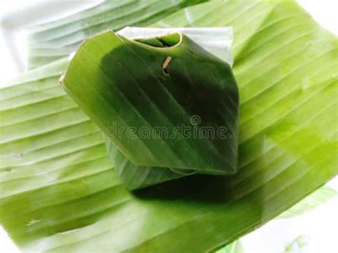 Sticky Rice Wrapped in Banana Leaves is a Dessert Made with Sticky Rice Wrapped in Banana Leaf ...