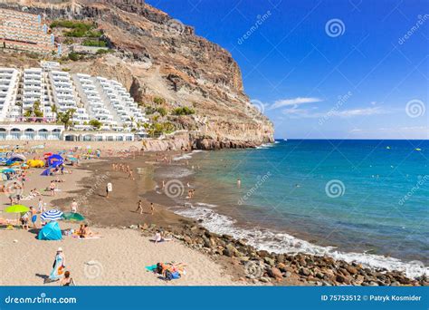 Tourists on Sun Holidays at the Taurito Beach, Gran Canaria Editorial Photography - Image of ...