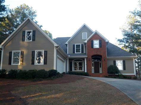 Love this colour combo red brick black shutters taupe siding | Red ...