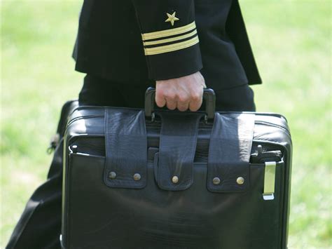 Why a mysterious black briefcase follows the US president everywhere ...