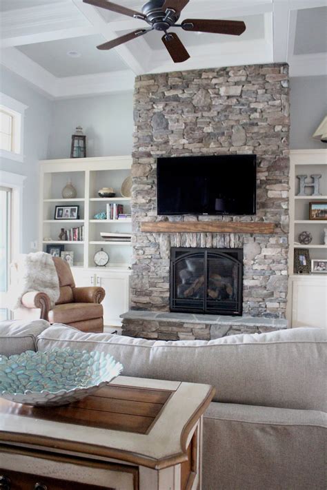 Impressive Rustic Stacked Stone Floor-to-Ceiling Fireplace — Homebnc