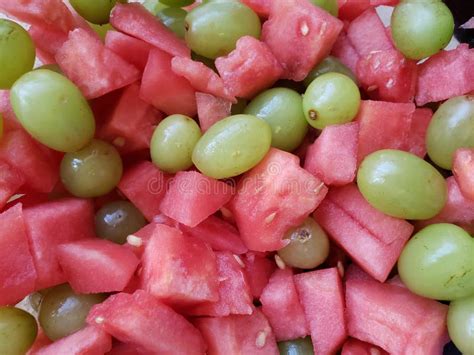 Pieces of Watermelon Fruit with Green Grapes, Background and Texture ...