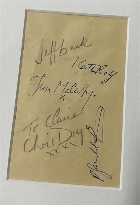 The Yardbirds - autographed display, mounted below a picture of the ...