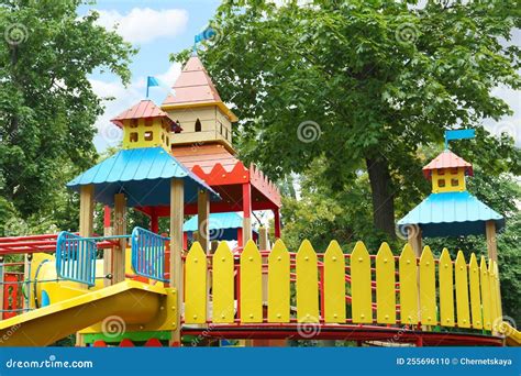 New Colorful Castle Playhouse with Slide on Children`s Playground Stock Photo - Image of ...