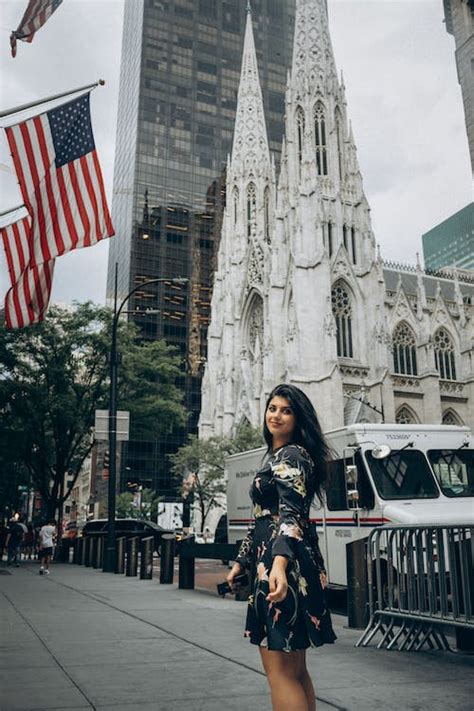 A Woman Walking in Sidewalk · Free Stock Photo