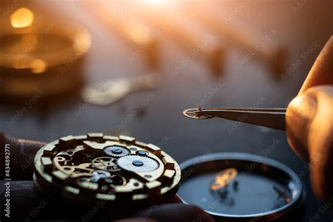 Mechanical watch repair process. Open pocket wristwatch. vel Stock Photo | Adobe Stock