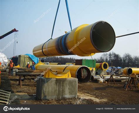 Construction of gas pipeline on the ground – Stock Editorial Photo © Leonid_Eremeychuk #152050240