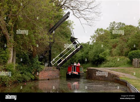 A man standing on the raised lift bridge at Hockley Heath on the ...