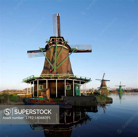 Netherlands, Northern Holland, Zaandam, windmills at Zaanse Schans - SuperStock