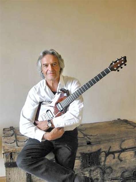 John McLaughlin, fusion guitarist and proud of it