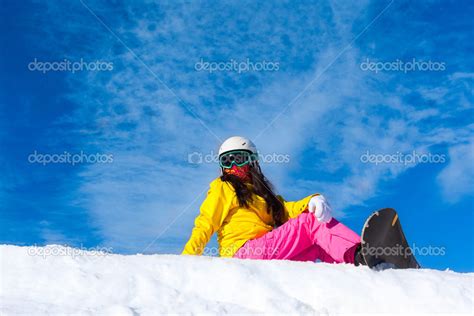 Snowboarder sitting on mountain slope — Stock Photo © mast3r #51023591