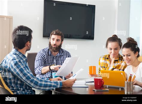 Group of happy creative people working in the office Stock Photo - Alamy