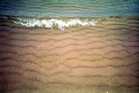 Water creates art in the sand II | BobbbyLight | Flickr