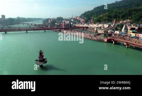 Aerial Shot of Haridwar city showing big statue of Hindu God Lord Shiva ...