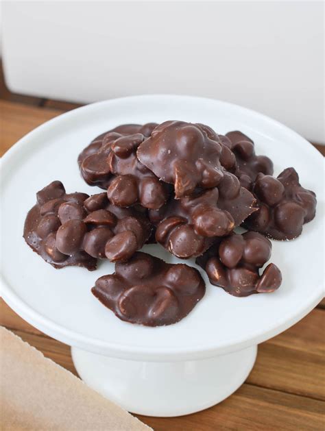 Chocolate Covered Macadamia Nuts on plate - 24 Carrot Kitchen | Chocolate covered nuts recipe ...