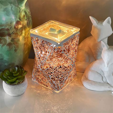 This warmer is a work of art! https://shop.ami.co/laurasampson/scentsy ...