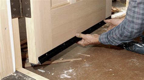 Installing Laminate Flooring Around Metal Door Frames – Two Birds Home