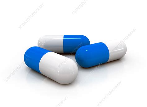 Blue and white capsules - Stock Image - F017/6051 - Science Photo Library