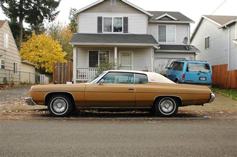 OLD PARKED CARS.: 1973 Chevrolet Impala Custom.