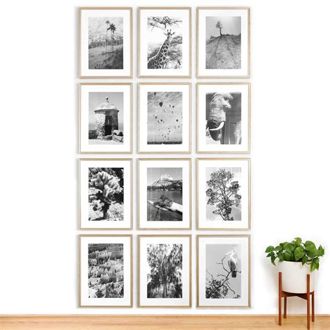 Gallery Walls: DIY Gallery Wall Designs | Framebridge Vertical Gallery Wall, Gallery Wall Grid ...