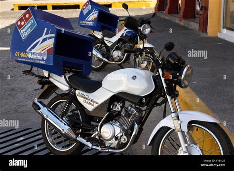 New motorbikes for pizza delivery in Puerto Vallarta Mexico Stock Photo - Alamy