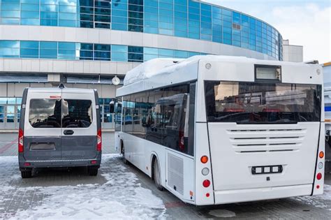 Premium Photo | Modern city buses at the bus station on a winter day