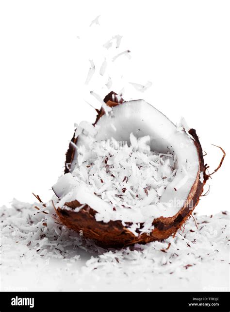 Coconut shavings in coconut isolated white Stock Photo - Alamy