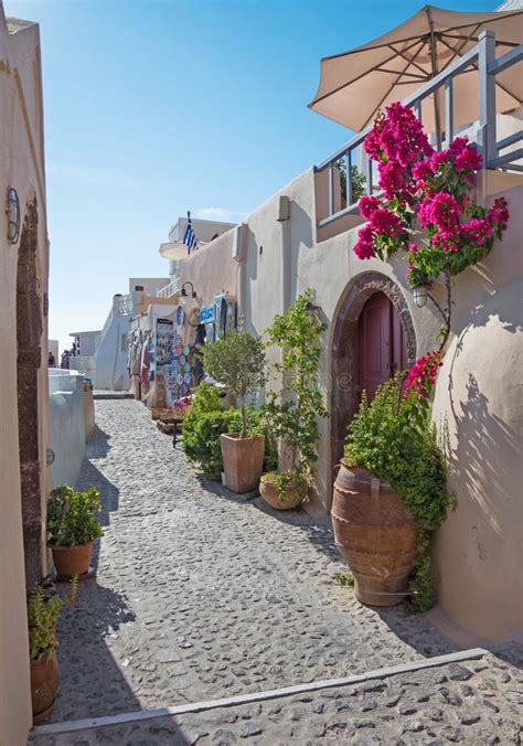 Santorini - The Street Of Oia With The Souvenirs Shops And Restaurants. Editorial Photo - Image ...