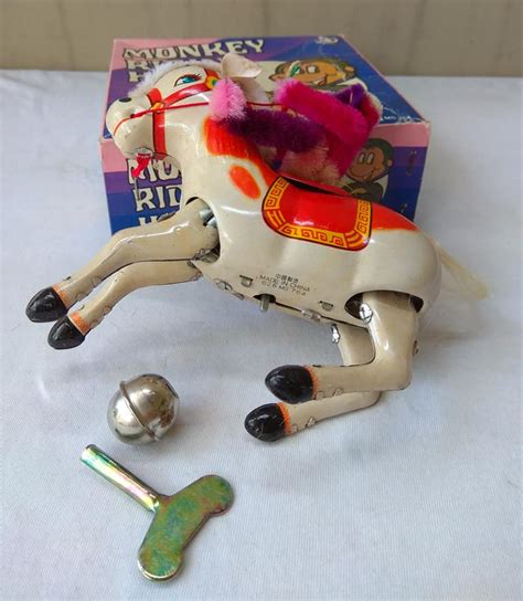 Toys Museum : Vintage Tin Toy Monkey Riding Horse - 275 rb