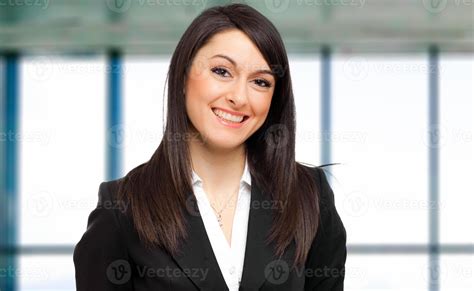 Young female manager in the office 754162 Stock Photo at Vecteezy