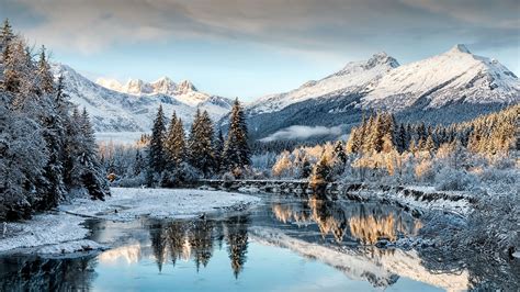 Mountain river valley in snowy winter | Windows Spotlight Images