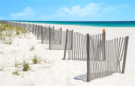 Sand Dune Fence On Pretty Beach Royalty Free Stock Photo - Image: 5317555