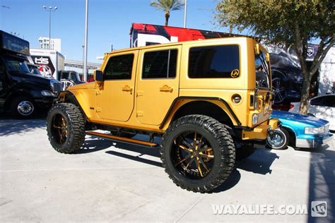 UNIQUE GOLD JEEP 4 DOOR WITH CUSTOM RIMS TIRES AND COLORS | Custom jeep wrangler, Jeep, Jeep ...