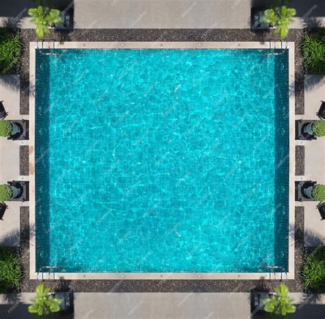 Premium Photo | Swimming pool blue water in summer top view angle ...